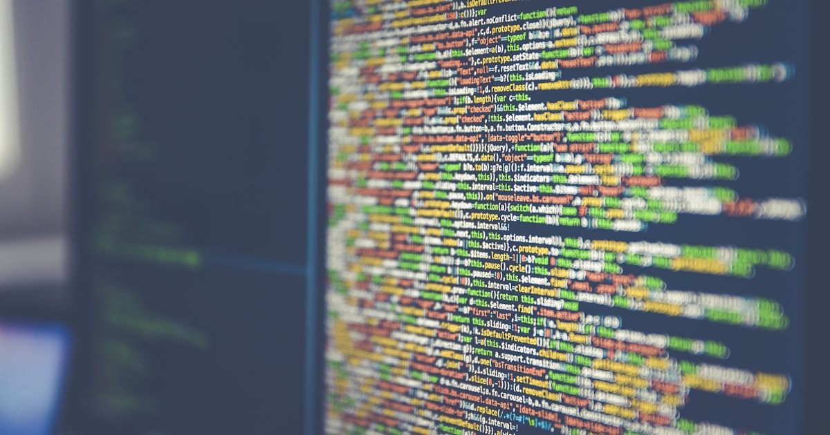 Colourful code on a dark screen