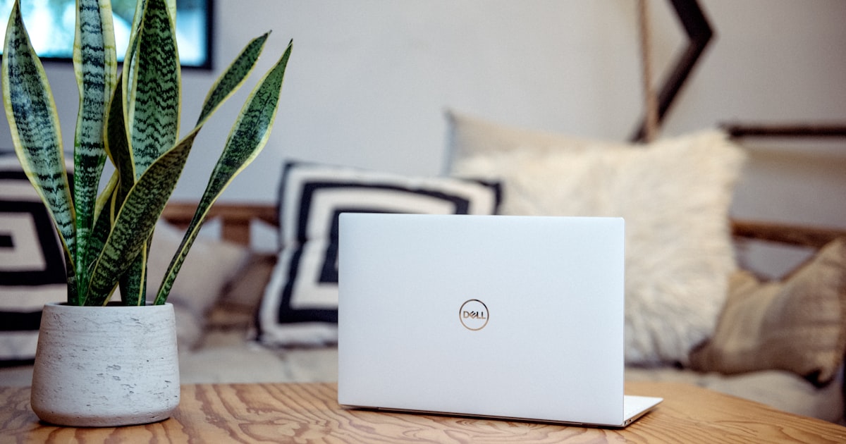 Laptop with a code editor open on a desk